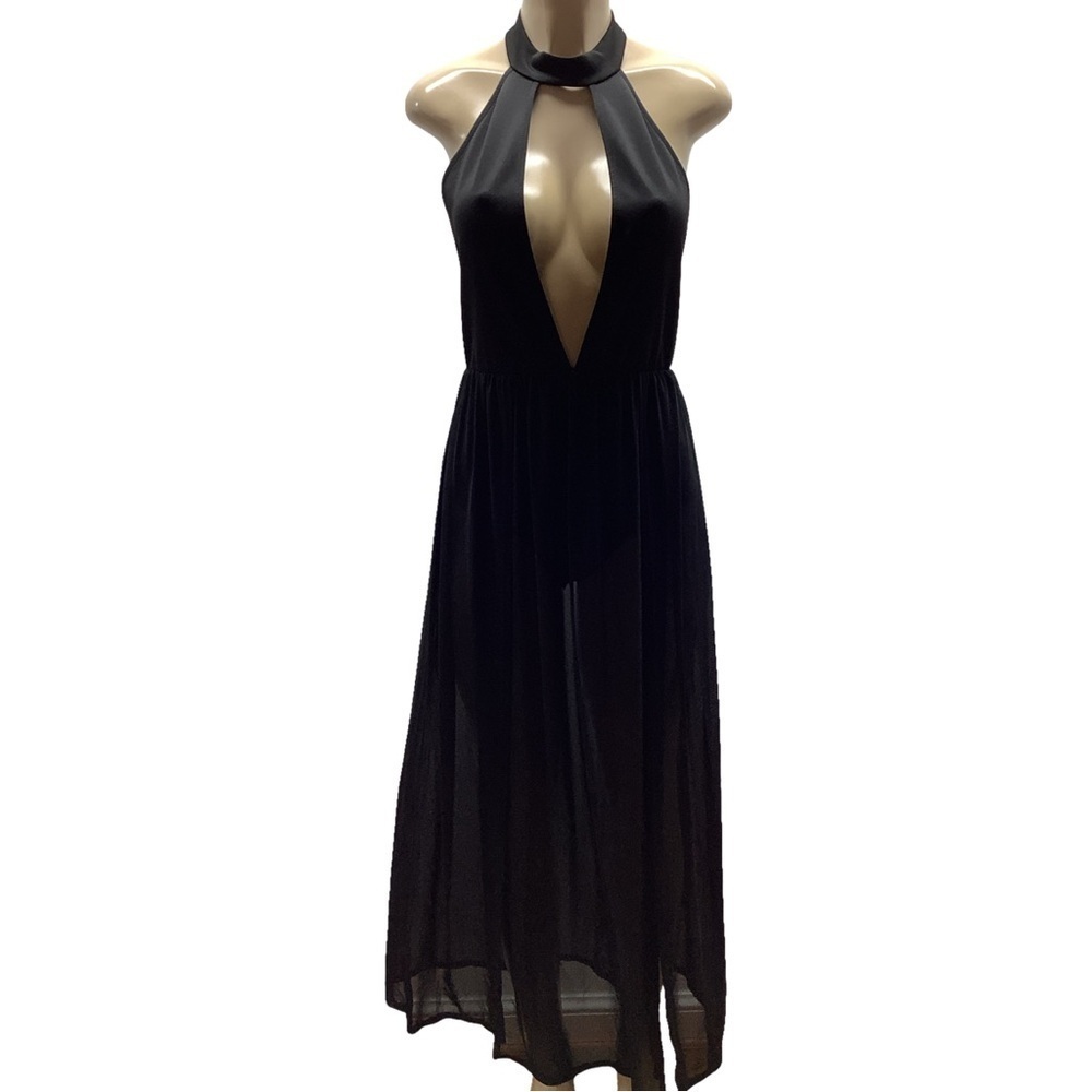 Tic Toc Size Large Black Dress will take you from a beachside to rendezvous.
